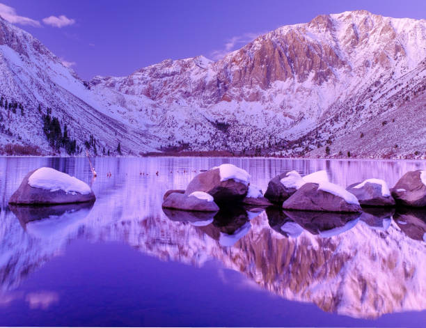 Frozen rivers and distant snow capped mountains