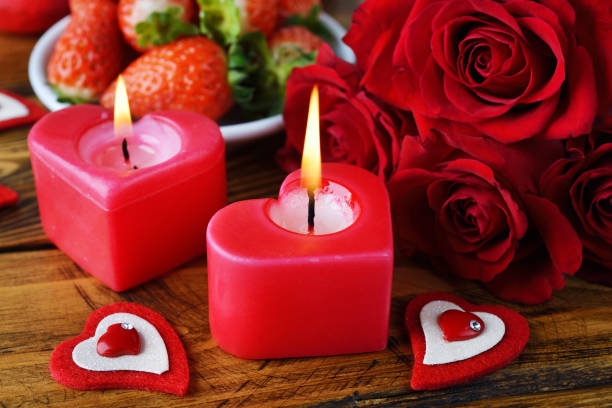 istock Red candles and roses 1217524486