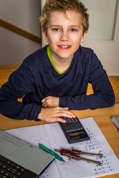 istock teenager doing  homework in mathematics 1217531059