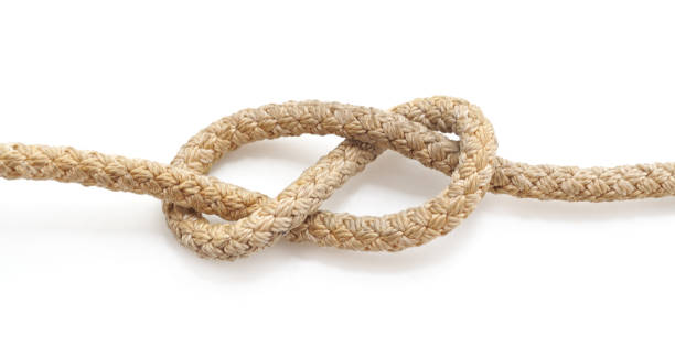 Marine knot from the old rope. Marine knot from the old rope isolated on a white background. lace fastener photos stock pictures, royalty-free photos & images