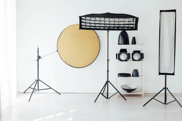 istock Photo studio accessories photographer flash white room 1217539825