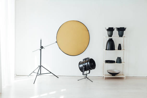 istock Photo studio accessories photographer flash white room 1217539963