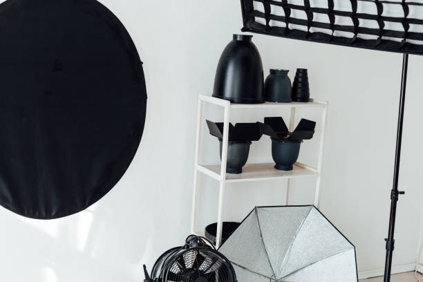 istock Equipment white photo studio accessories photographer flash 1217540758