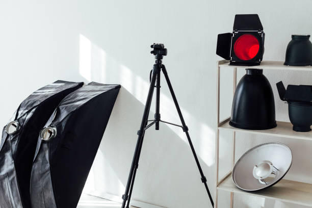 istock Equipment white photo studio accessories photographer flash 1217541774