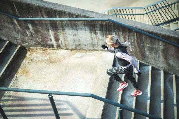 istock Running up the staircase 1217544550