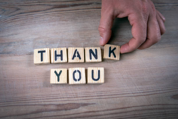 Thank You. Service delivery, survey, reliability and security concept. Alphabet letters on wooden table