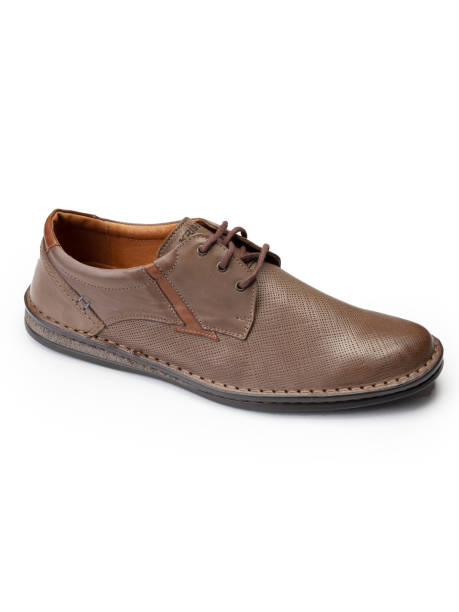 istock Men's shoes on a white background 1217548786