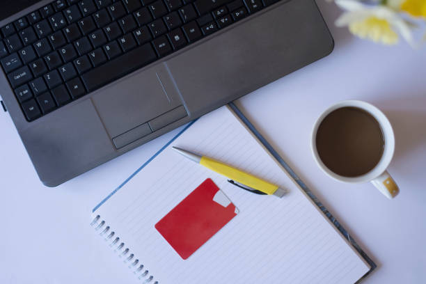 istock Top view of home desk office 1217551825