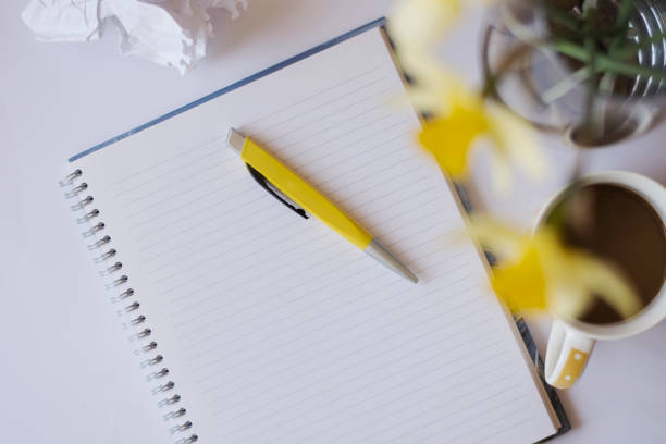 istock Top view of home desk office 1217551878