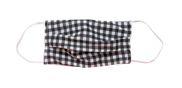 istock Fabric mask with rubber ear straps isolated on white background and clipping path 1217553094