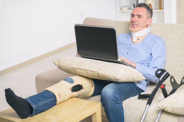 istock Man with leg in knee cages 1217556246