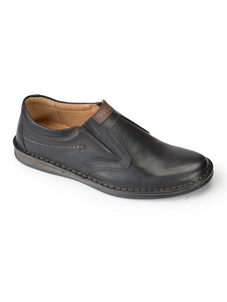 istock Men's shoes on a white background 1217556500