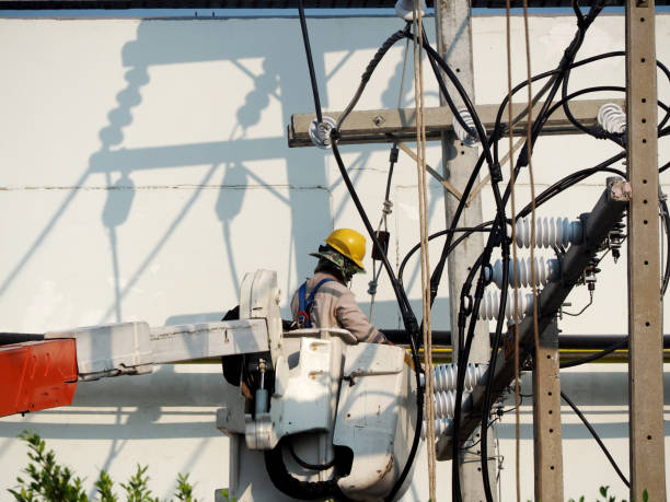 istock electrician man working at height and dangerous ,high voltage power line maintenance 1217557143