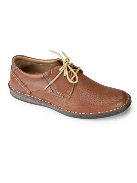 istock Men's shoes on a white background 1217557185