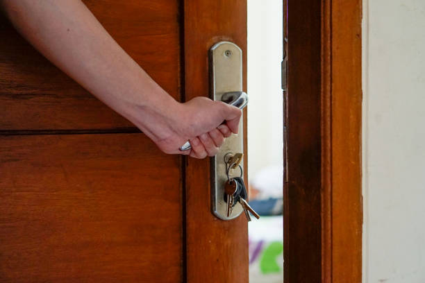 istock Hand holding door handle while stay at home 1217558179