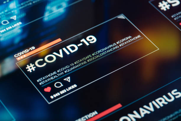 istock #COVID-19 hashtag for social networks close-up on digital display 1217559885