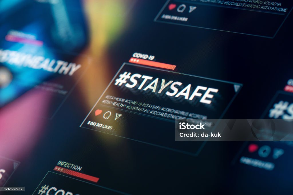 #staysafe. Stay safe hashtag close-up on digital display #staysafe. Stay safe hashtag close-up on digital display. A hashtag encouraging people to stay home and not risk health due to COVID-19 coronavirus disease. Accidents and Disasters Stock Photo