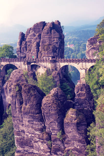 istock Bridge between rocks near Rathen, Germany, Europe (Sachsian Switzerland) 1217560896