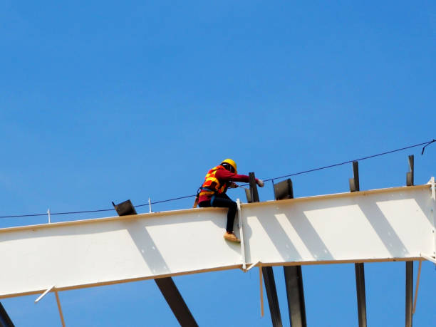 istock Man Working on the Working at height with blue sky 1217561022