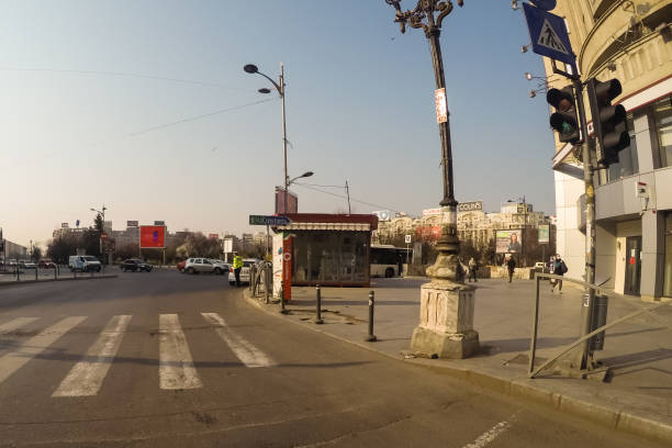 Changes and complications caused by coronavirus epidemy, world without crowds, virus empties streets. No traffic jam, no pollution, empty streets in downtown Bucharest, Romania, 2020