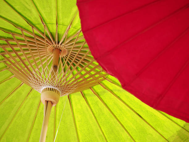 istock Beautiful Colorful paper umbrellas background 1217563057