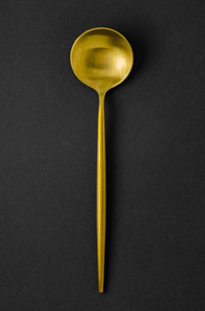 trendy modern cutlery is a golden spoon.