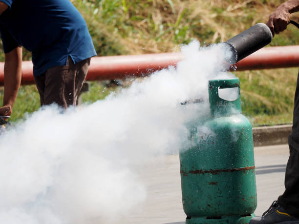 istock firefighter training., fireman using water and extinguisher to fighting with fire flame in an emergency situation 1217566288