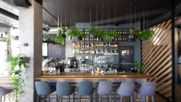 istock Bar counter with soft chairs in cafe with no visitors 1217566969