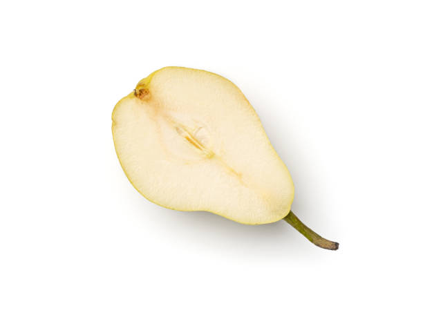 Pear isolated on white background Fresh pears cut in half isolated on white background. Top view perfect pear stock pictures, royalty-free photos & images