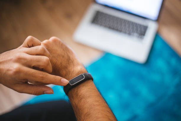 istock Close up image hand of male using smart watch 1217569628