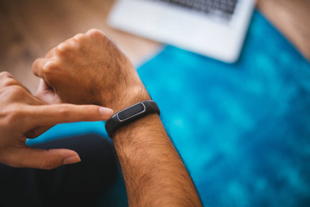 Close up image hand of male using smart watch