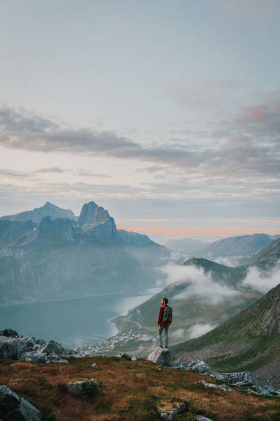 istock Man hiking in mountain on Senja island 1217569844