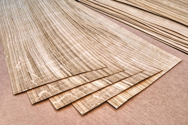 istock Oak veneer. Oak texture. Spliced oak veneer on the table in the workshop 1217570212