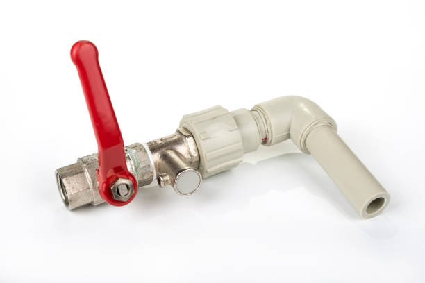 istock Used water valve with a plastic pipe on a white 1217571154