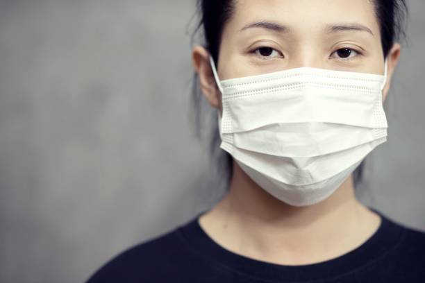 istock Thai Woman Wearing Protective Mask 1217571290