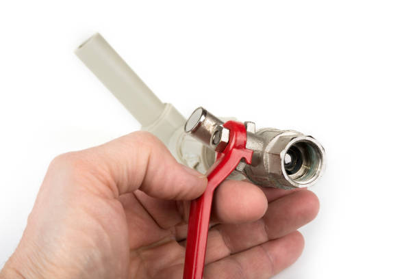istock Used water valve with a plastic pipe on a white 1217571787