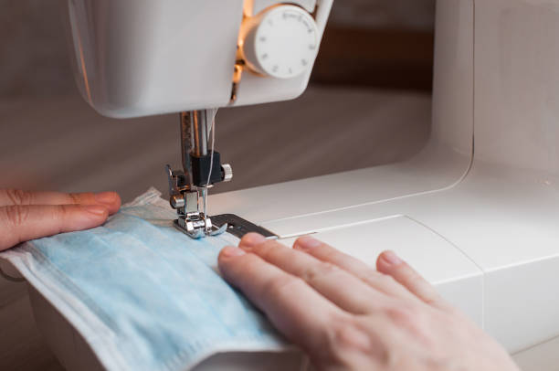 istock Sewing the medical mask on a sewing machine 1217575288