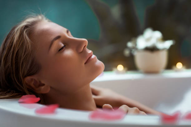 istock Beautiful girl taking bath at home 1217576069