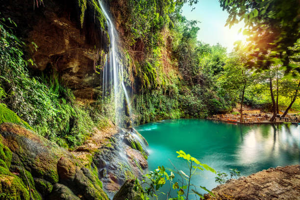 Peaceful view on the waterfall Peaceful view on the waterfall and the fresh greenery around the picturesque lagoon, Baakleen, Lebanon lagoon stock pictures, royalty-free photos & images