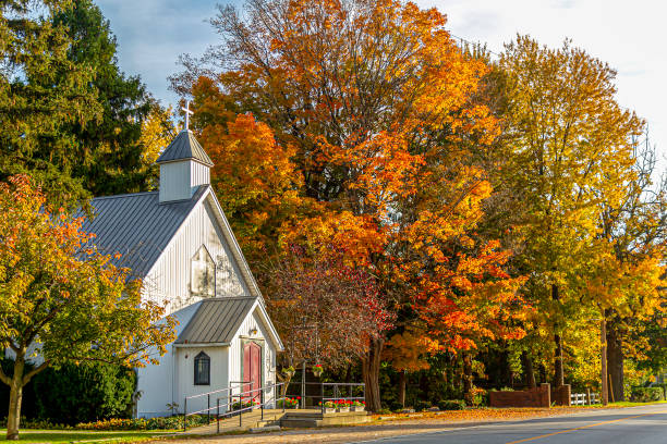 Small Rural Church This small rural church really looks great with all the fall color protestantism stock pictures, royalty-free photos & images