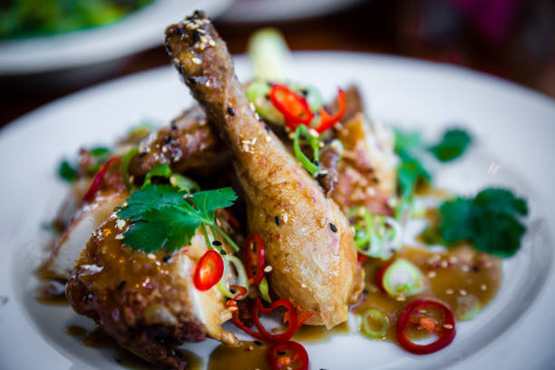 Grilled chicken legs with Vegetables. Juicy spicy chicken legs.Top view.