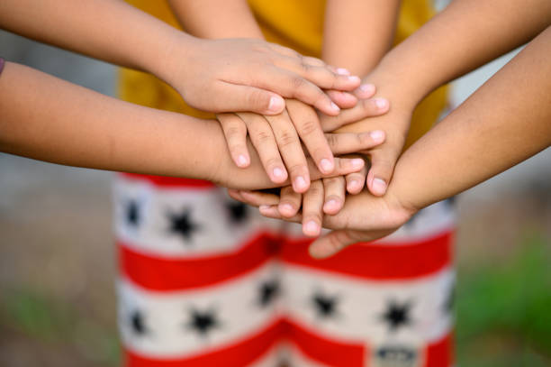 istock Children touch each other to indicate the struggle for success. 1217578142
