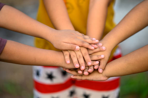 istock Children touch each other to indicate the struggle for success. 1217578150