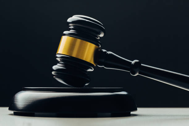 istock Judge's gavel on a black table. Concept of law 1217578290