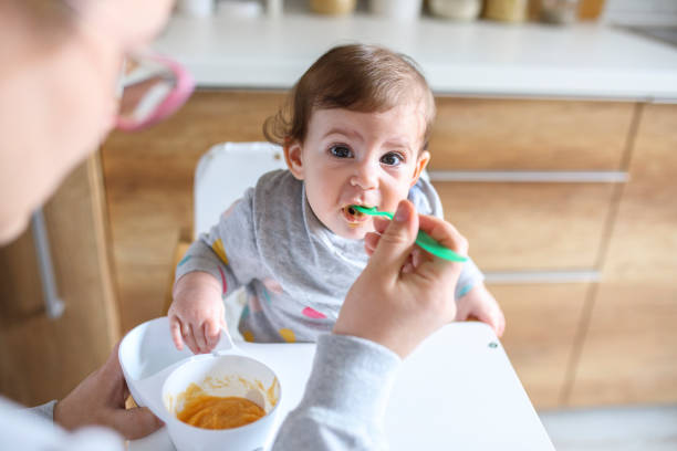 istock Feeding The Baby 1217581369