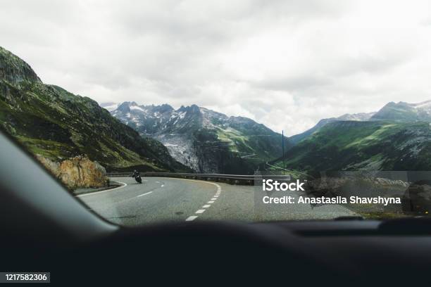 View From The Car Of The Dramatic Mountain Pass By Car In Switzerland Stock Photo - Download Image Now