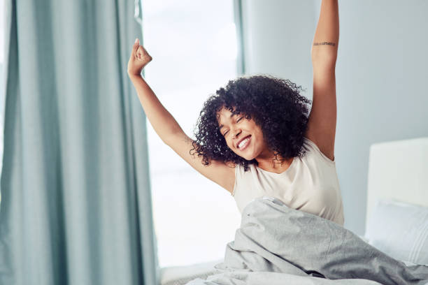 wake up, there's life to be lived! - wake up stretching women black imagens e fotografias de stock