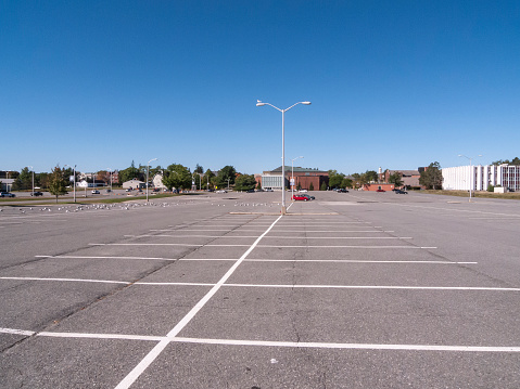 Orono, Maine, USA - September 23, 2018: Large, empty parking lot on University of Maine campus on autumn weekend