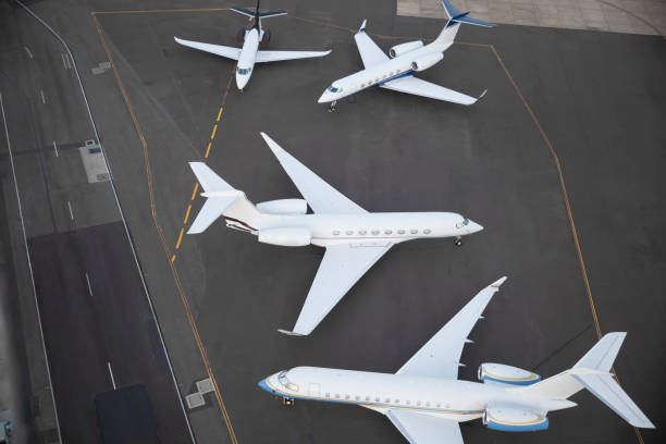 istock Unbranded aeroplanes waiting on runway 1217586395