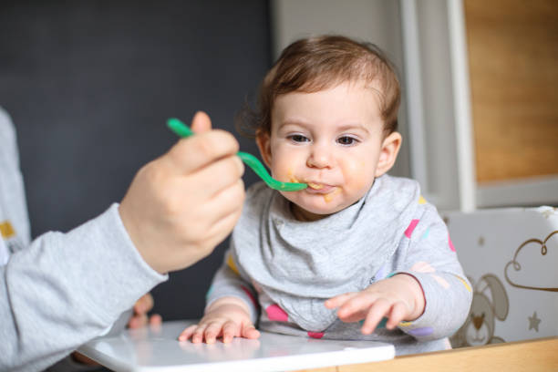 istock Feeding The Baby 1217587960